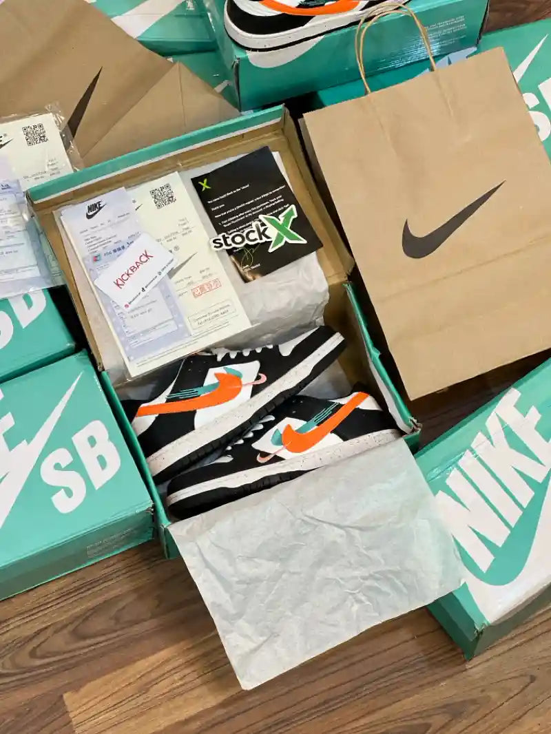 Nike Dunk low ‘Multiple Swooshes’ (Orange Swoosh)